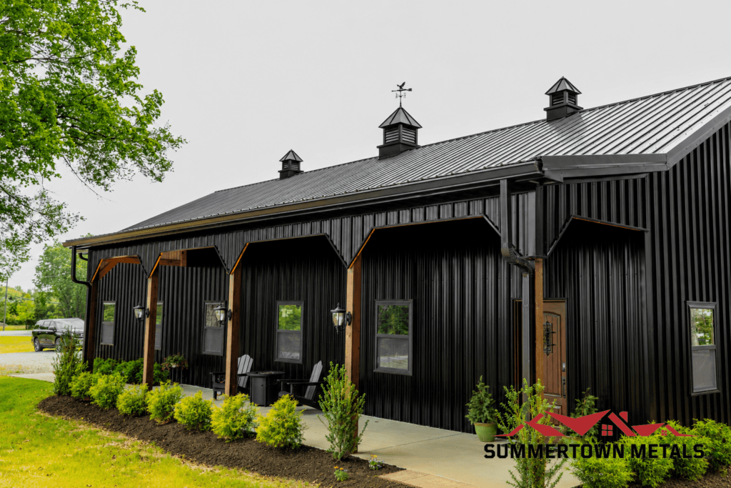 Saved By Design all black garage workshop side shed and cupolas