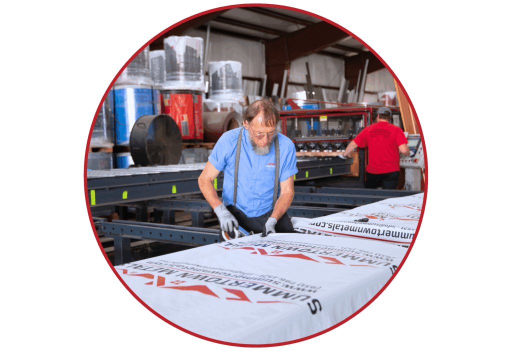 team member preparing house wraps
